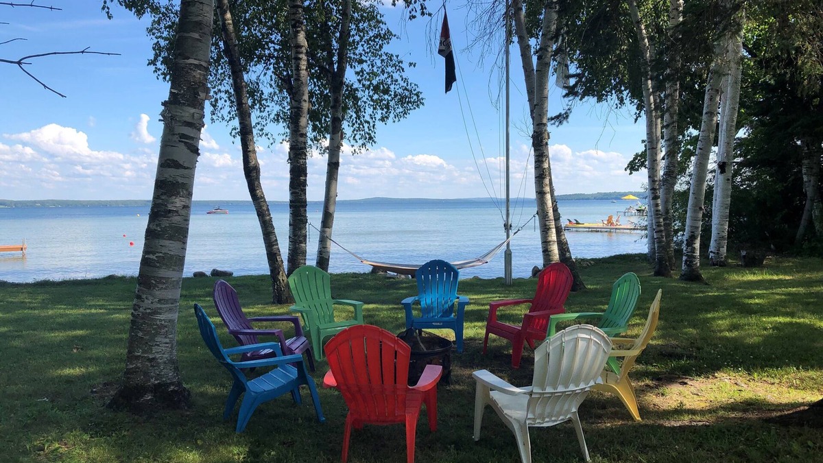 Brutus Cottage | Peaceful setting on northwest shore of Burt Lake - sleeps 12