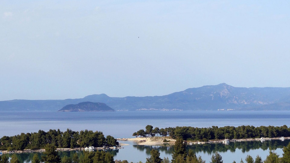 Pefkochori Villa | Pefkochori villa with a stunning panoramic view and a waterfall private pool.