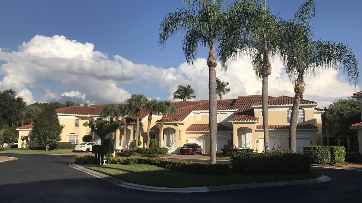 Pelican Bay Condo | Pelican Bay, Lambiance Garden Condo, second floor with full lake western view.