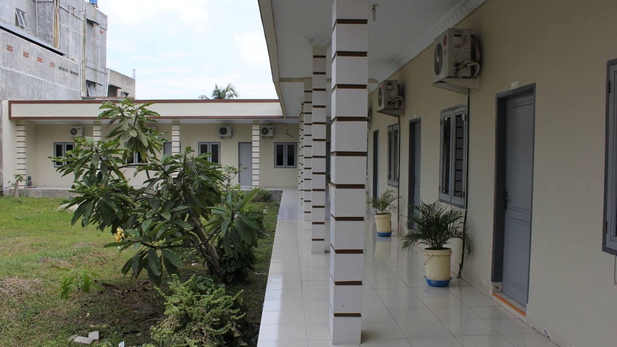 Medan House | Penginapan Transit Tomato