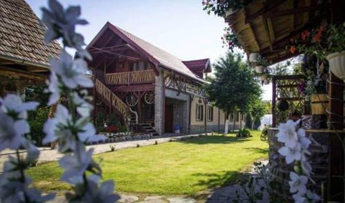 Cartisoara House | Pensiunea Dealu Morii