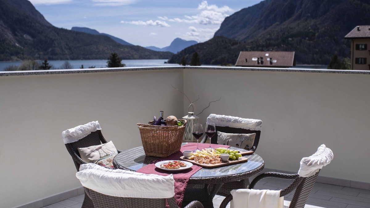 Molveno Apartment | Penthouse with lake and mountain views in Molveno