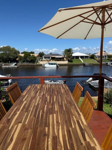 Bongaree House | Pet Friendly - Plunge Pool Canal Sunset View - Private Jetty