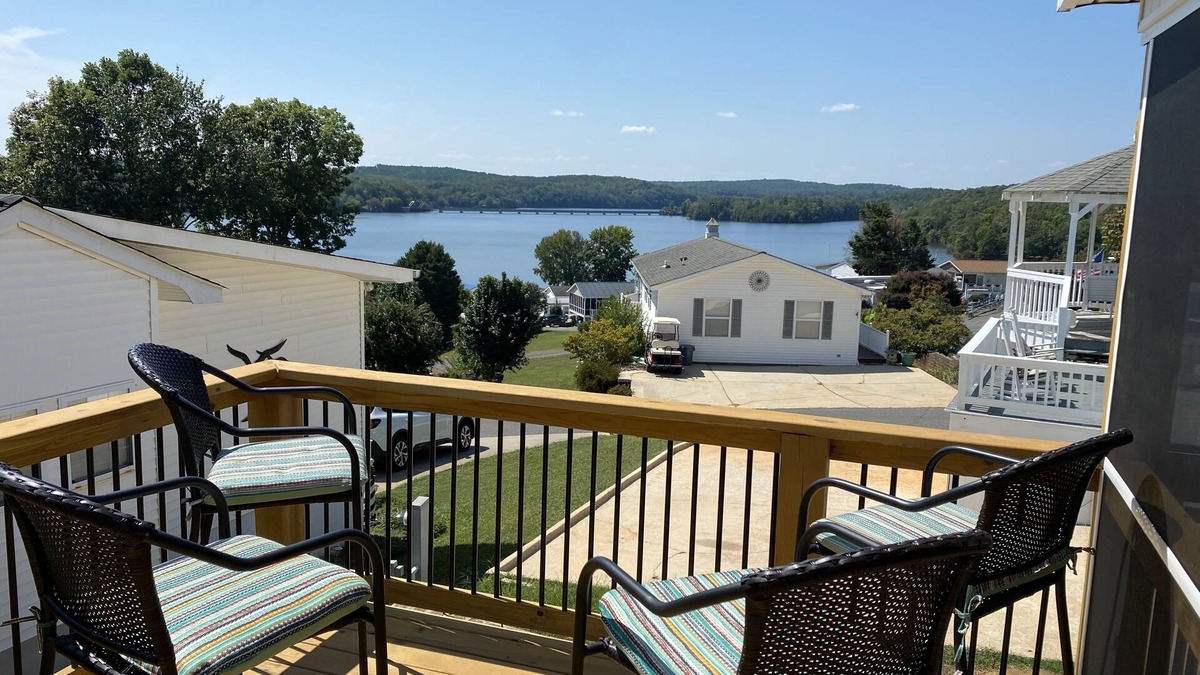 New London House | Phoenix Tiny House at Badin Shores Resort, lake view, porch, pool, beach, marina