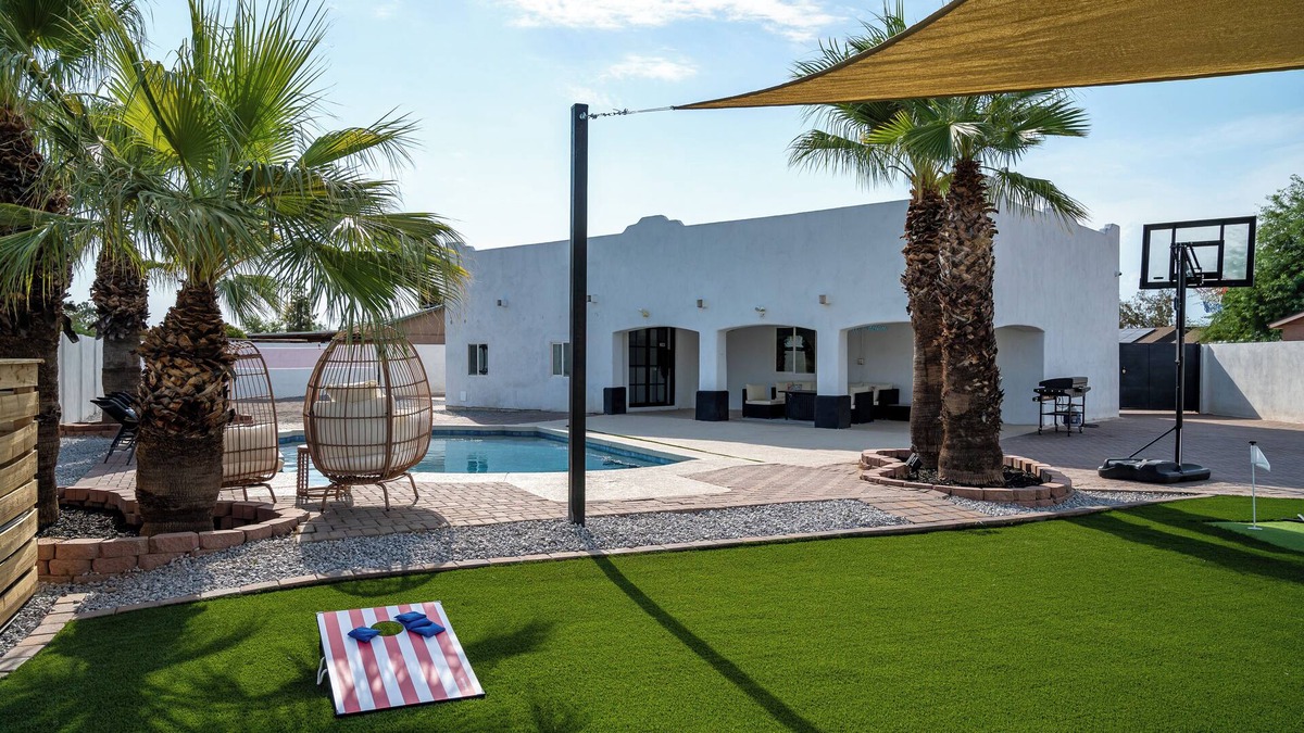 Maryvale House | Phoenix Villa - Private Resort Style backyard, Pool, Volleyball, Putting Green