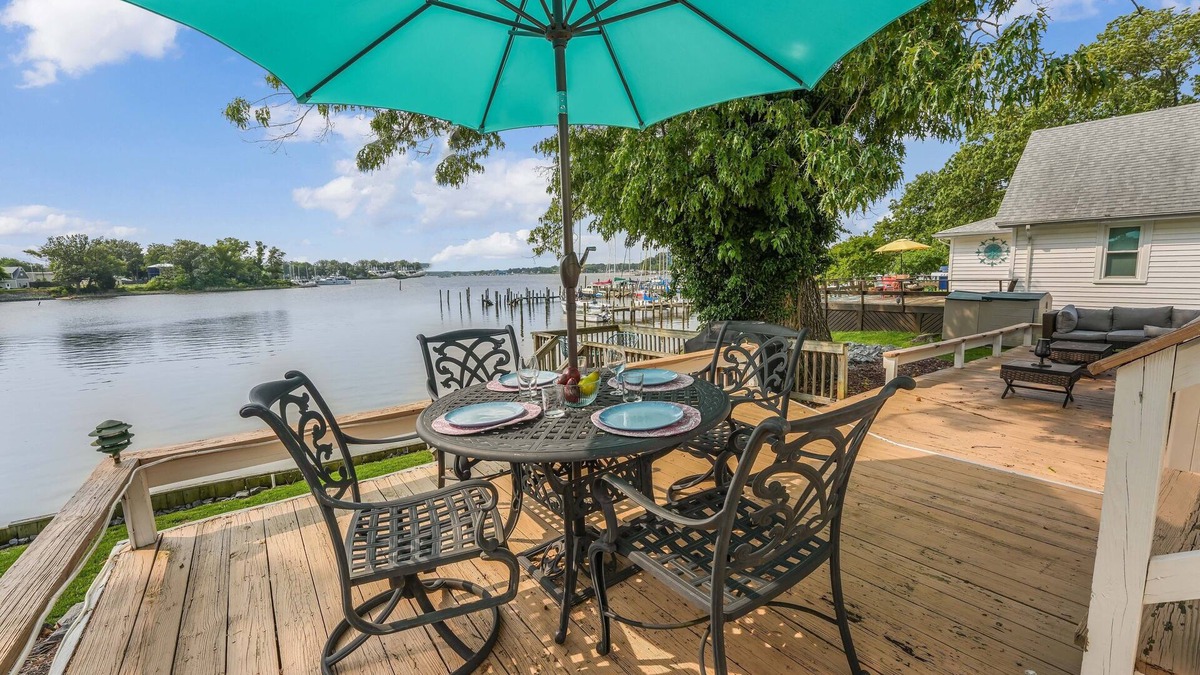 Colonial Beach House | Picture Perfect Waterfront in town Sleeps 6 Expansive Outdoor dining area