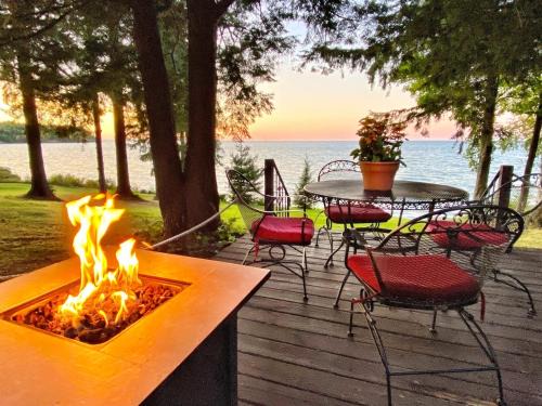 Sodus House | Pine Cottage Lakefront Hot Tub Fire Pit