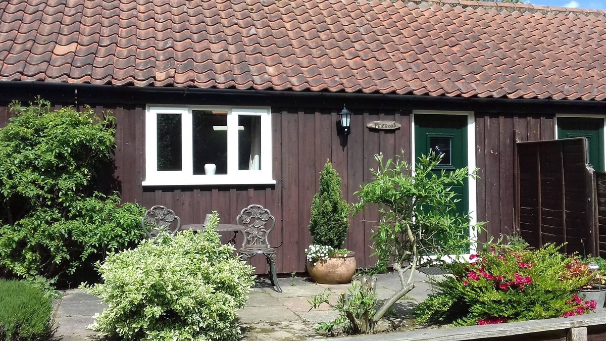 Thorpe Market Cottage | Pinewood Cottage - Set Around An Old Farmyard In A Village Location