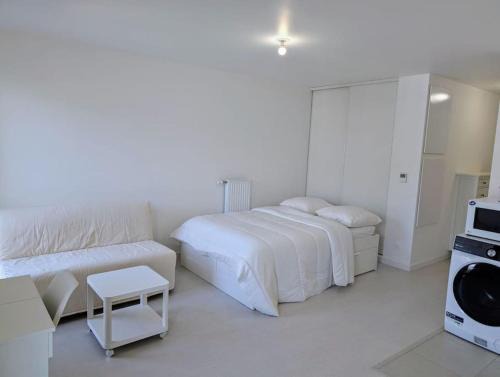 Sartrouville Apartment | Plume, Studio & Parking gratuit à Sartrouville - Ville à 20 min de Paris