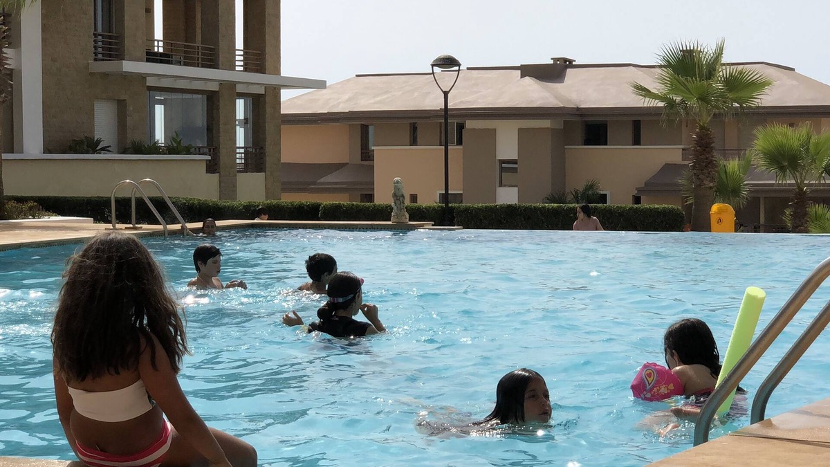 Plage des Nations Apartment | Prestigia plage des nations seen on sea and swimming pool high standing apartment