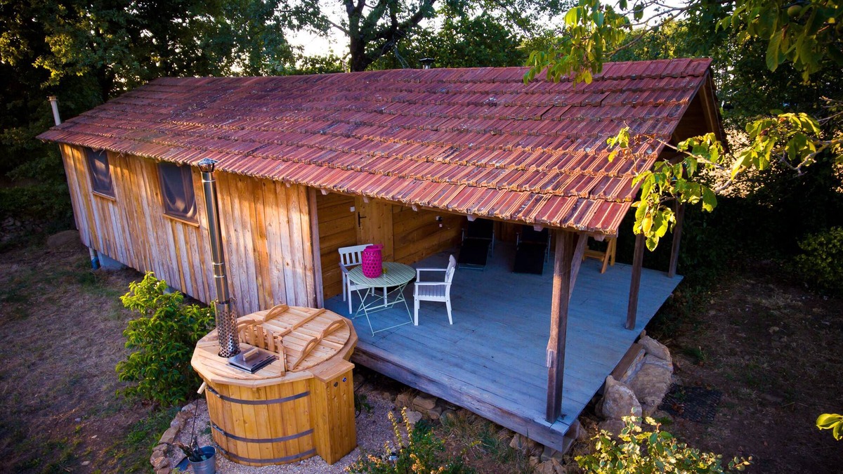 Espinas Cabin | Pretty cabin in beautiful gardens with wood stove & Nordic spa hot-tub/jacuzzi.