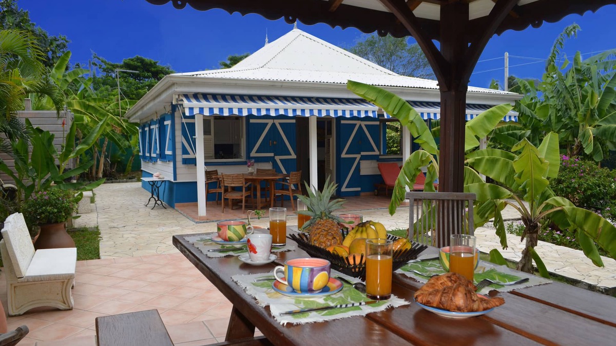 Sainte-Anne Villa | Pretty, old Creole villa with veranda, gazebo and floral garden.