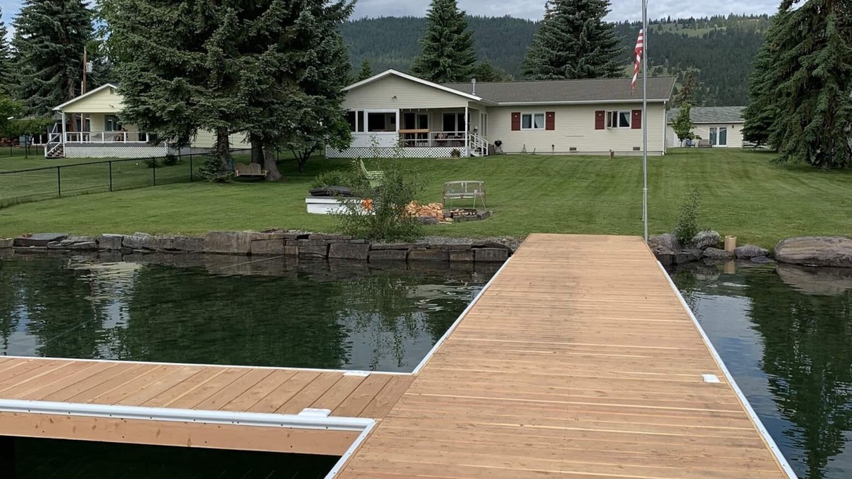 Big Arm House | Prime Lakefront home w/guest house - extra charge, dock, firepit, large yard