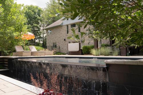 Elora Apartment | Private Basement Suite with Pool & Hot Tub Access