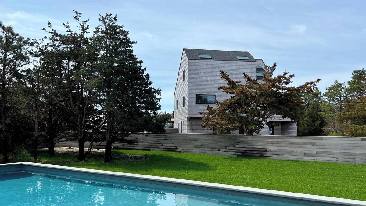Katama House | Private island retreat in Katama: pool, gourmet kitchen + stunning ocean views.