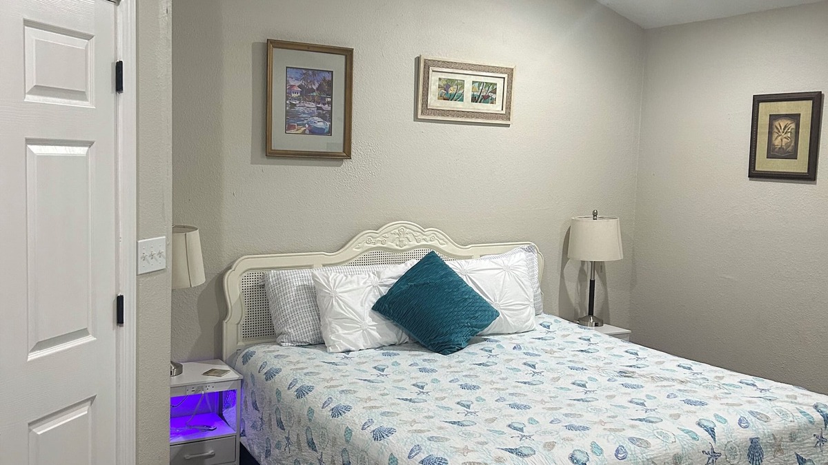 Apalachicola House | Private King Room with outdoor entrance, deck, and private bathroom.