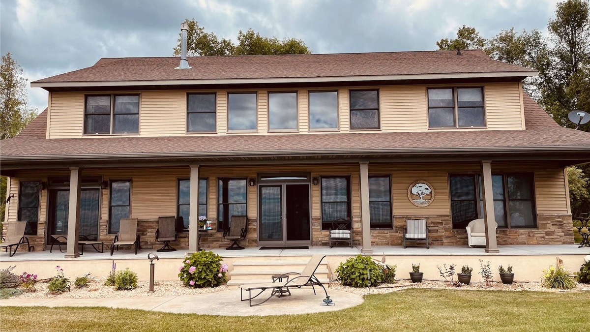 Ingalls House | Private lakefront home with 1,200 feet of sandy beach. A year-round retreat.