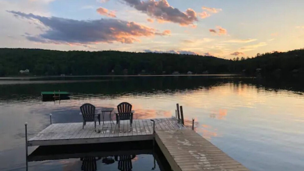 Concord RV Rental | Private Lakeside Camping with Included Tent, Air Mattresses, Kayaks, Fire Wood