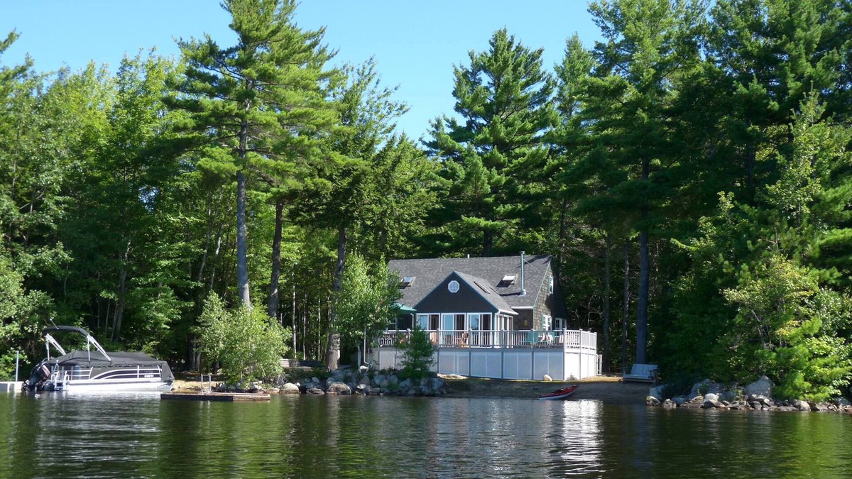 Middleton House | Private Peninsula, 600’ Of Waterfront + Sandy Beach on Sunrise Lake