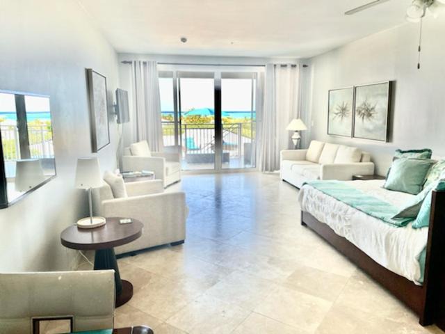 The Bight Apartment | Private Poolside, Loft-Like Condo with Panoramic Grace Bay Views, Walk to Beach, Restaurants, & Turtle Cove Marina!