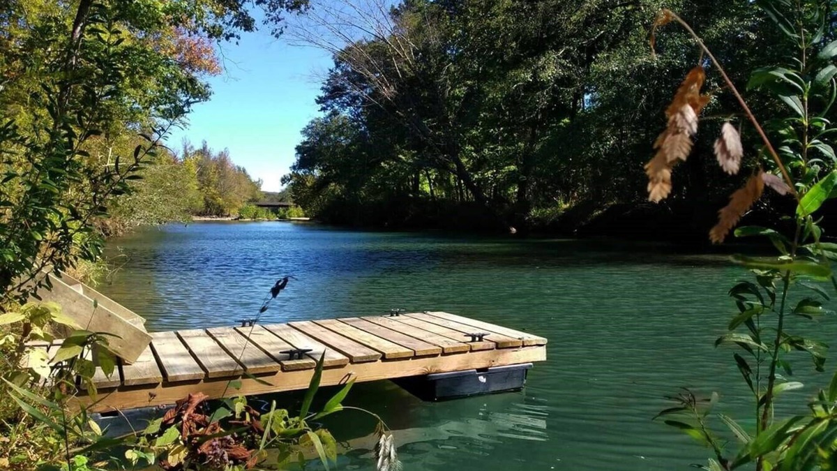 Caddo Gap RV Rental | Private River Tent Camping with Kayaks & Outdoor Bathhouse! Pet friendly!