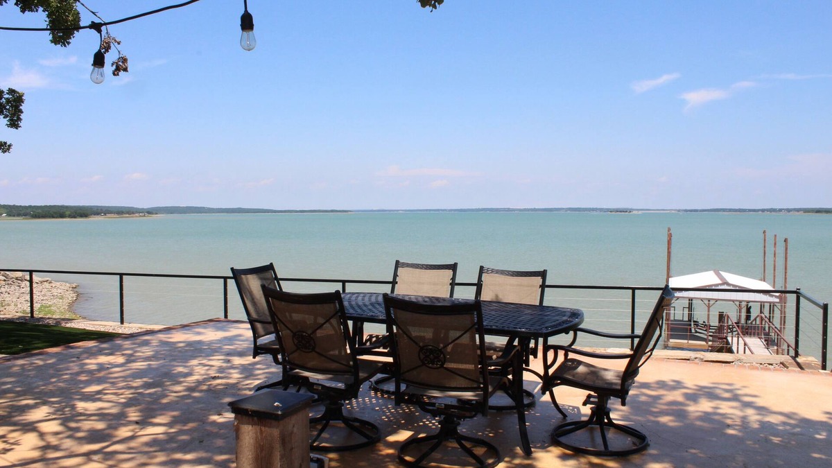 Runaway Bay House | PRIVATE, SECLUDED LAKEFRONT RETREAT WITH BOAT DOCK, LARGE PATIOS AND HOT TUB!