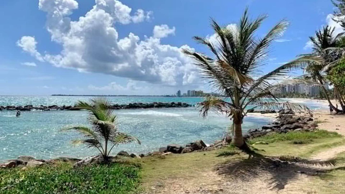 Punta Las Marias Apartment | Puerto Rico Beachside Rental w Pool Otium Rentals