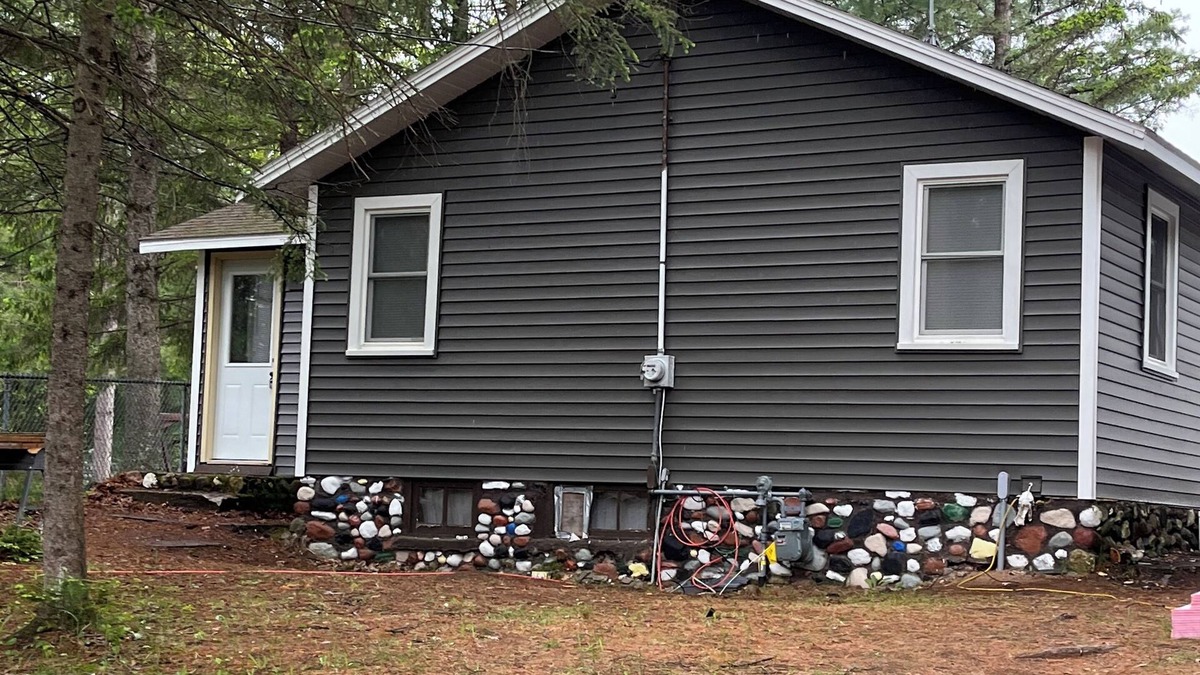 Arbor Vitae Cabin | Quaint 2 bedroom cabin overlooking Brandy Lake in beautiful Minocqua/Woodruff.