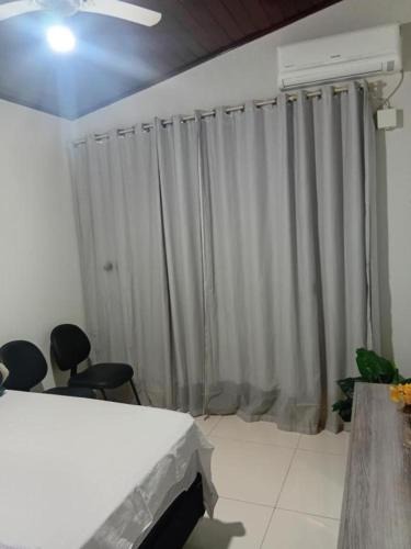 Plano Diretor Sul House | Quarto em residencia