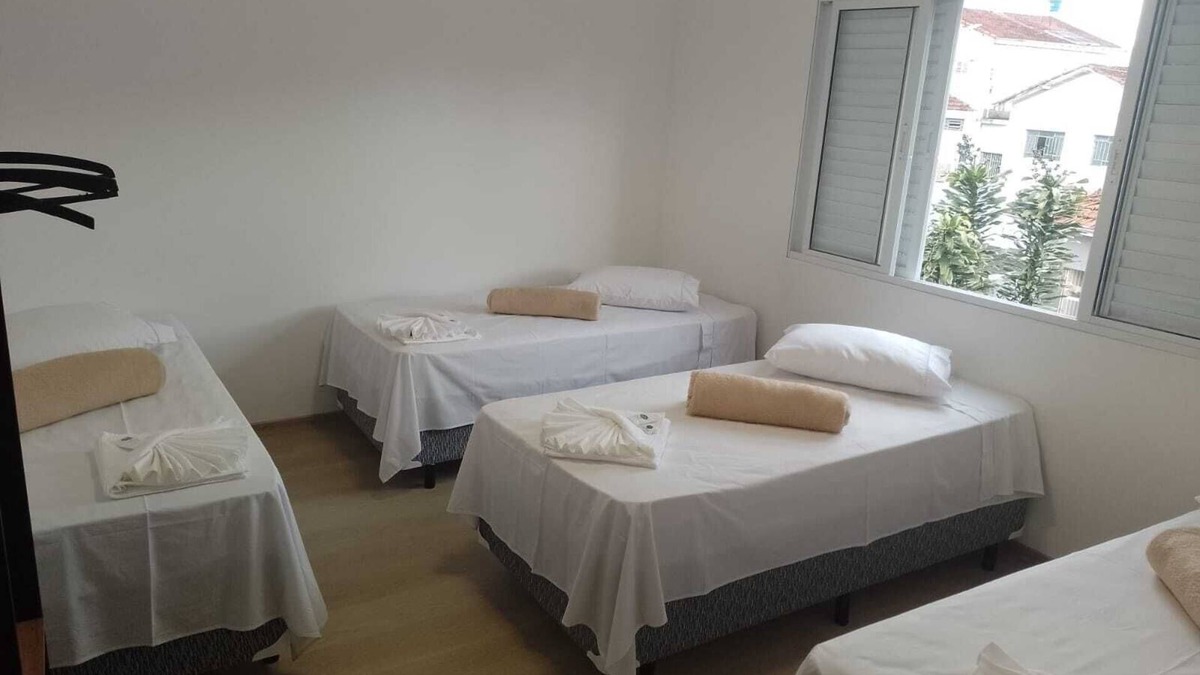 Paraisopolis Apartment | Quarto Família Superior na Pousada Verissimus