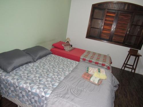 Vila Gardenia House | Quarto Pitanga