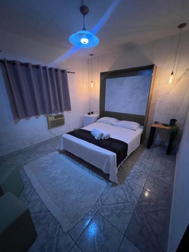 Jardim Primavera House | Quarto suite em Caraguatatuba