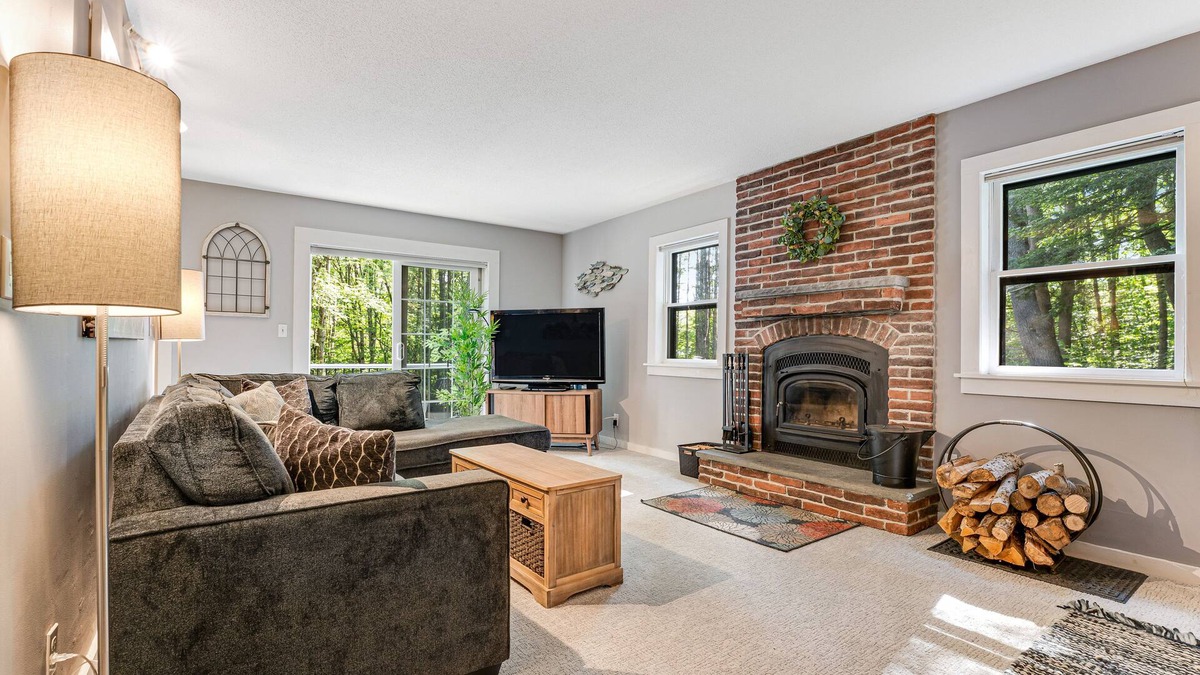 West Hartford House | Quechee Lakes home on three acres - trail access, fireplace, AC - dog-friendly