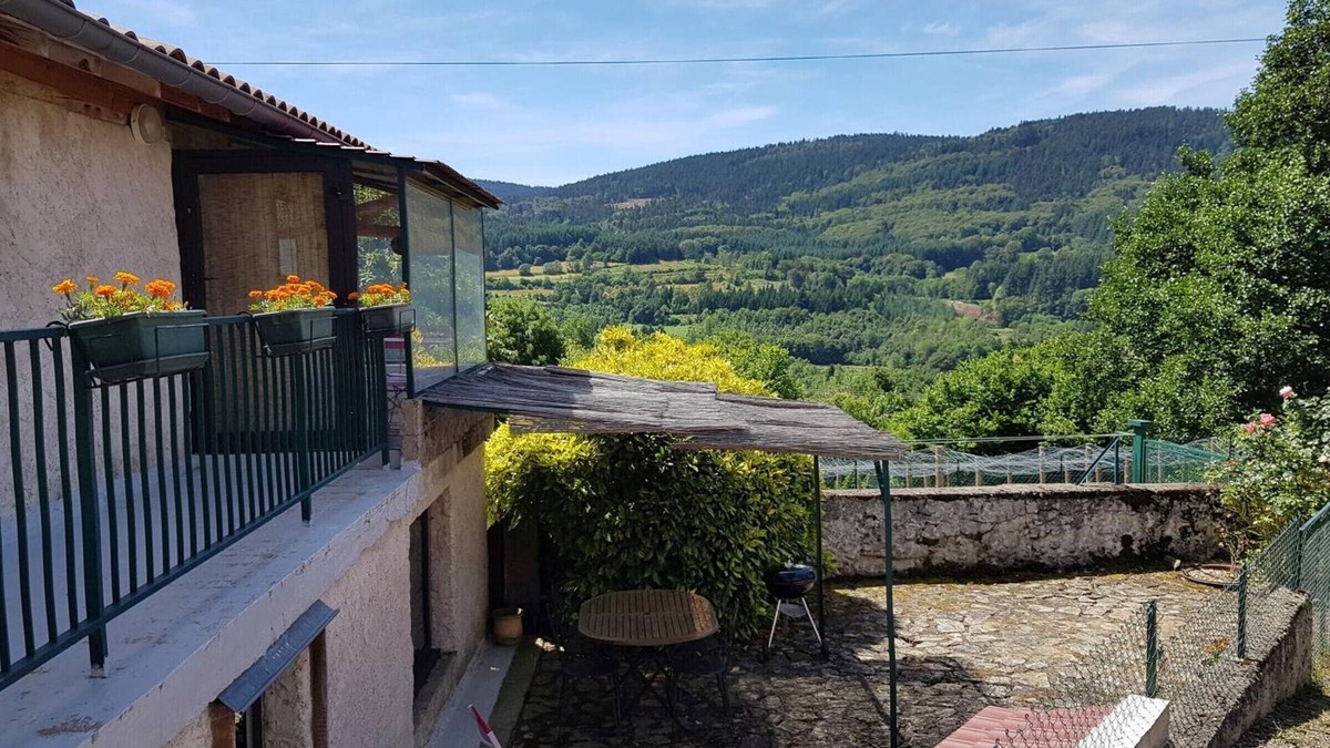 Laprugne Cottage | Quiet cottage with wood stove, terrace, and pets allowed