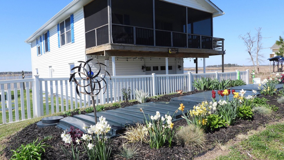 Prime Hook Beach House | Quiet dog friendly home overlooking nature preserve, 1 block from private beach.