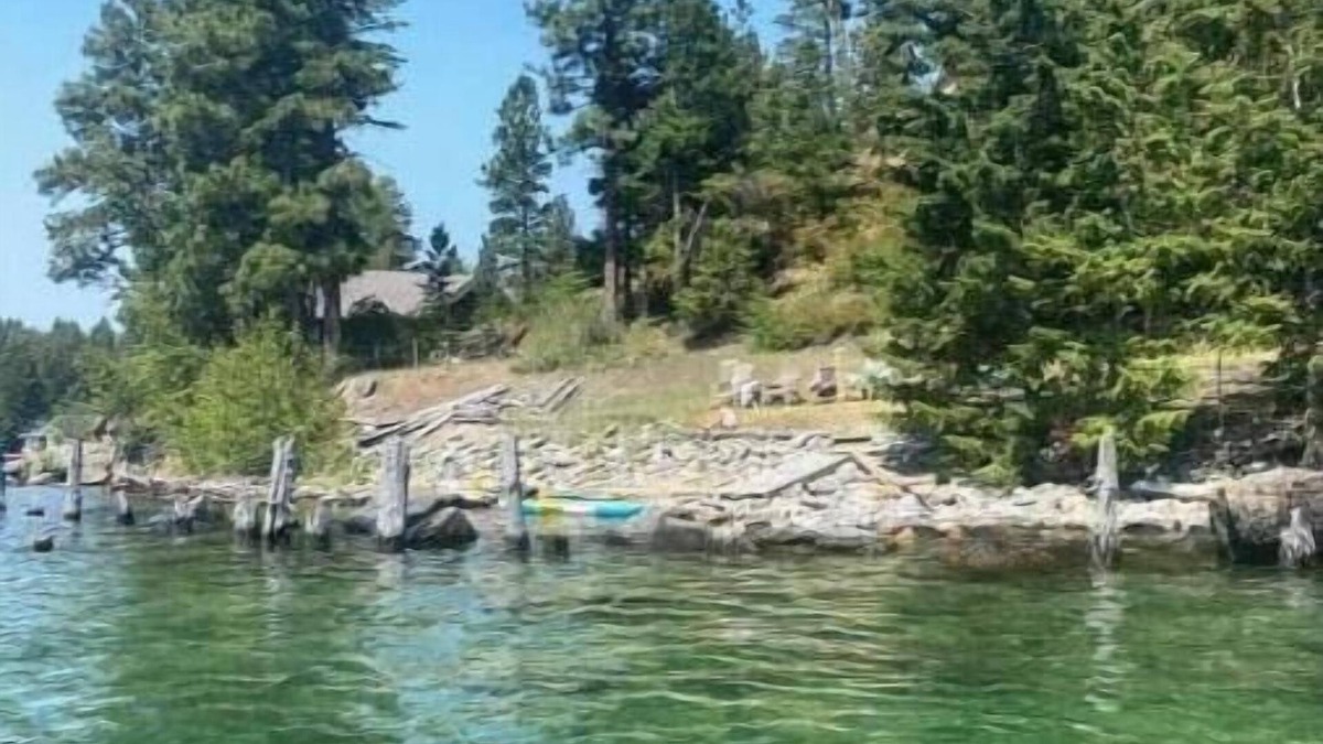 Woods Bay House | RARE FIND: Over 200' of Flathead Lake Lakefront with distinctive home