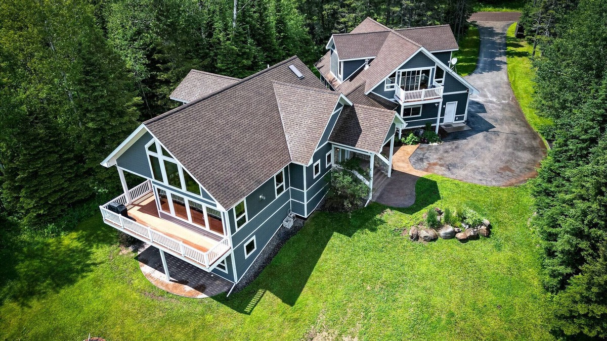 Two Harbors House | Rare large contemporary four bedroom home with forest and lake views + EV Charge