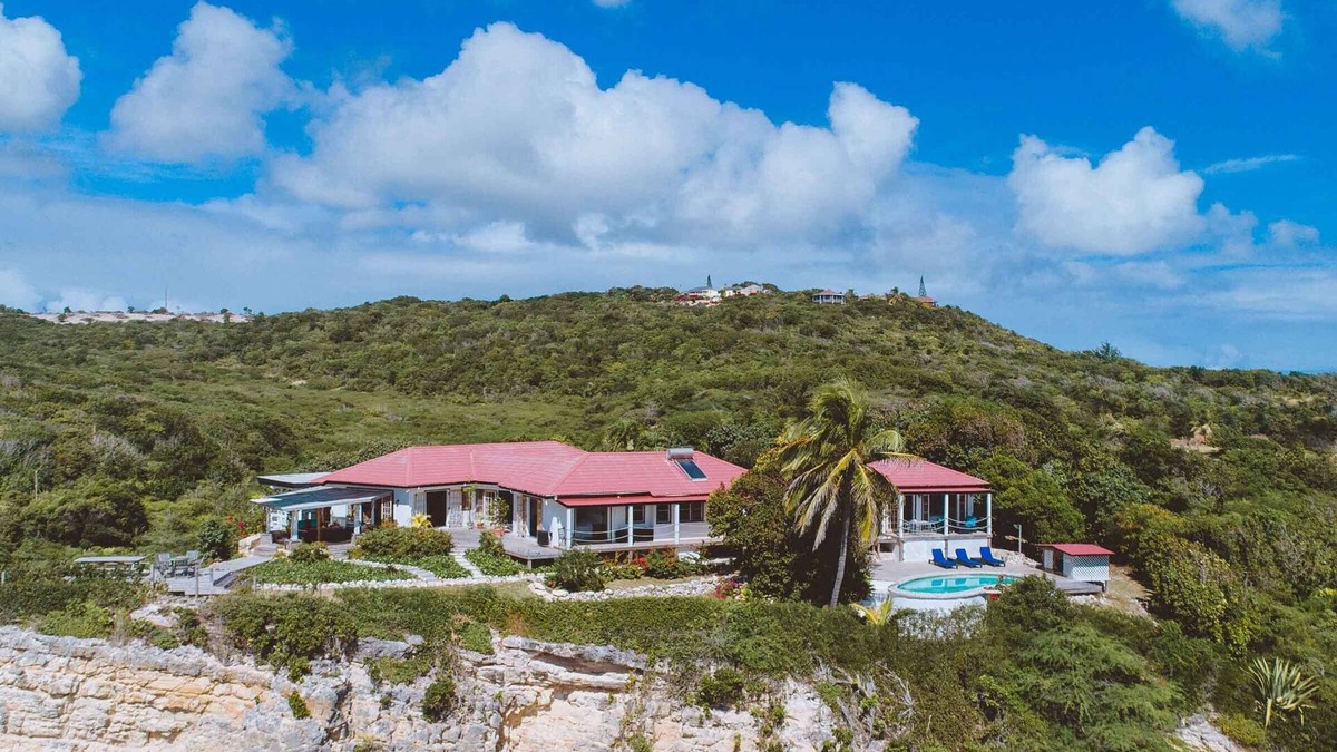 Freetown Villa | Raw And Rustic Waterfront Retreat. One Of A Kind Home In A Unique Location