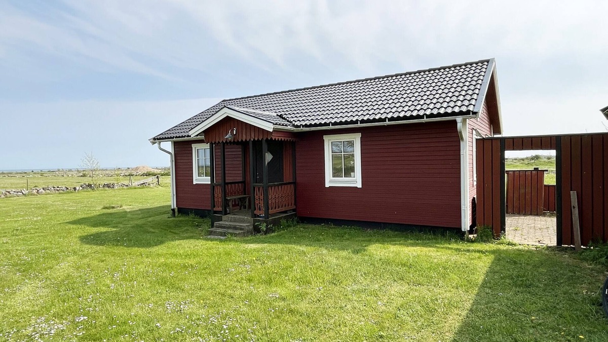 Alby House | Red cozy cottage with sea view | SE04035
