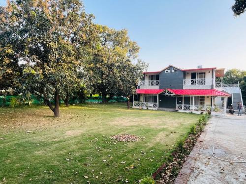 Ramnagar House | Red roof in