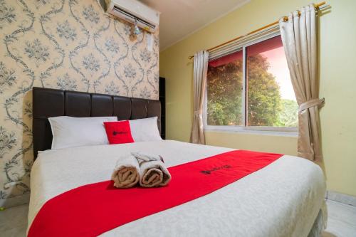 Kemanggisan House | RedDoorz near Tomang 2