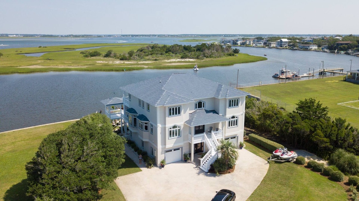 The Point House | Redone Luxury Waterfront at The Point w/Heated Pool, Hot Tub, Fire Pit, Game Rm