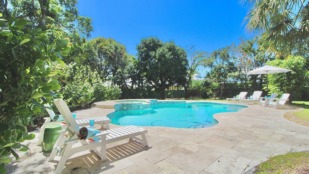 Stuart House | Reduced Rates! 4BR/3BA Home - Heated Pool - - Close to Beach and Historic Downtown Stuart!
