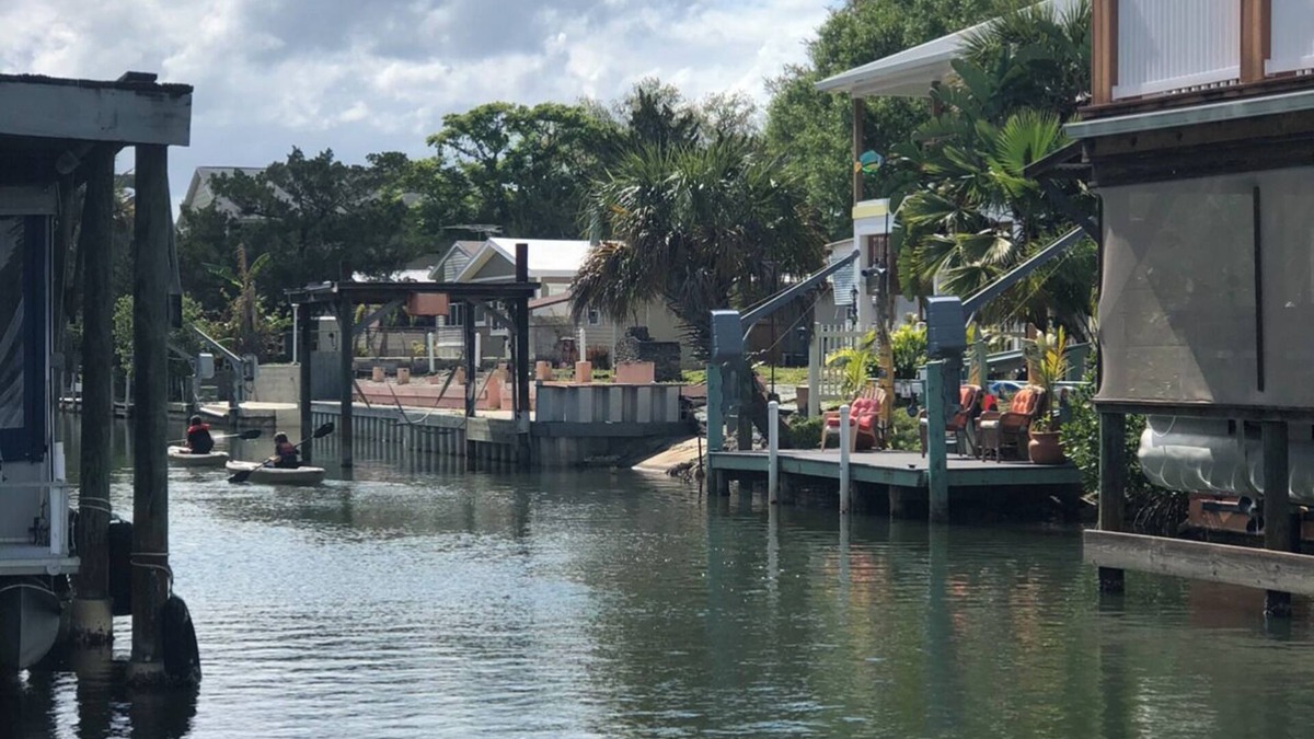 Indian Harbor Estates House | Reel Paradise Cottage- Canal Front- Bring your Boat to our 50’ Dock!