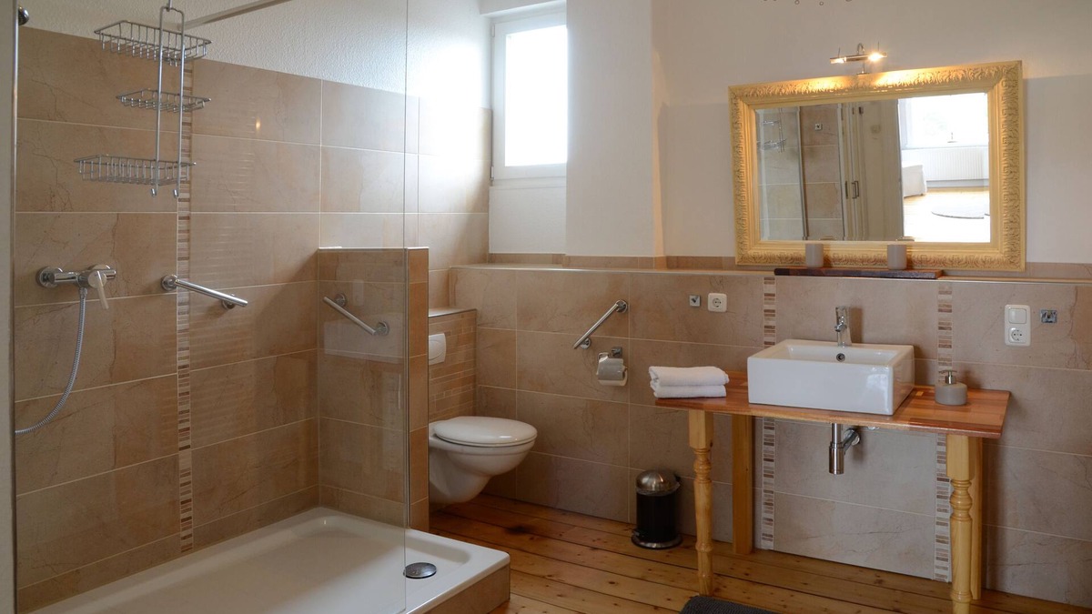 Cranz Apartment | Refurbished old building including tiled stove, double doors and direct water view
