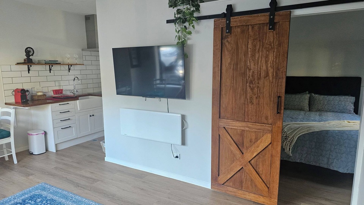 Long Bay Apartment | Relax and enjoy the North Shore in this cozy and stylish unit.