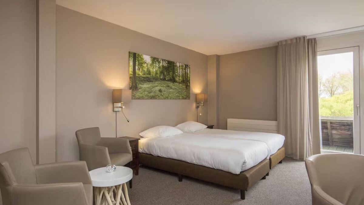 Velsen-Zuid Hotel | Relax and Unwind with Free Parking, On-Site Dining, and Stunning Lake View