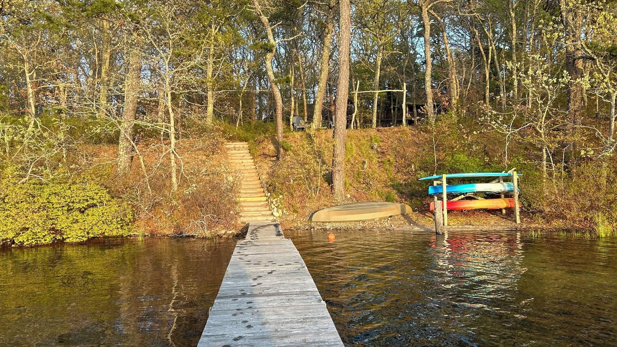 Harwich House | Relax in a tranquil log home on direct lake front property. The Hermitage awaits