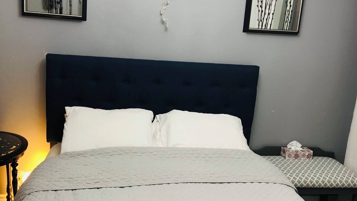 Saint Thomas House | Relax in our cozy room with a private bath, designed for comfort and privacy.