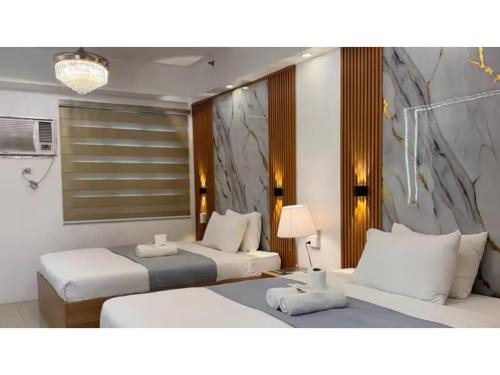 Barangay 76 House | Relax in Pasay Citys Best Kept Secret - Spacious Condo with Garden View